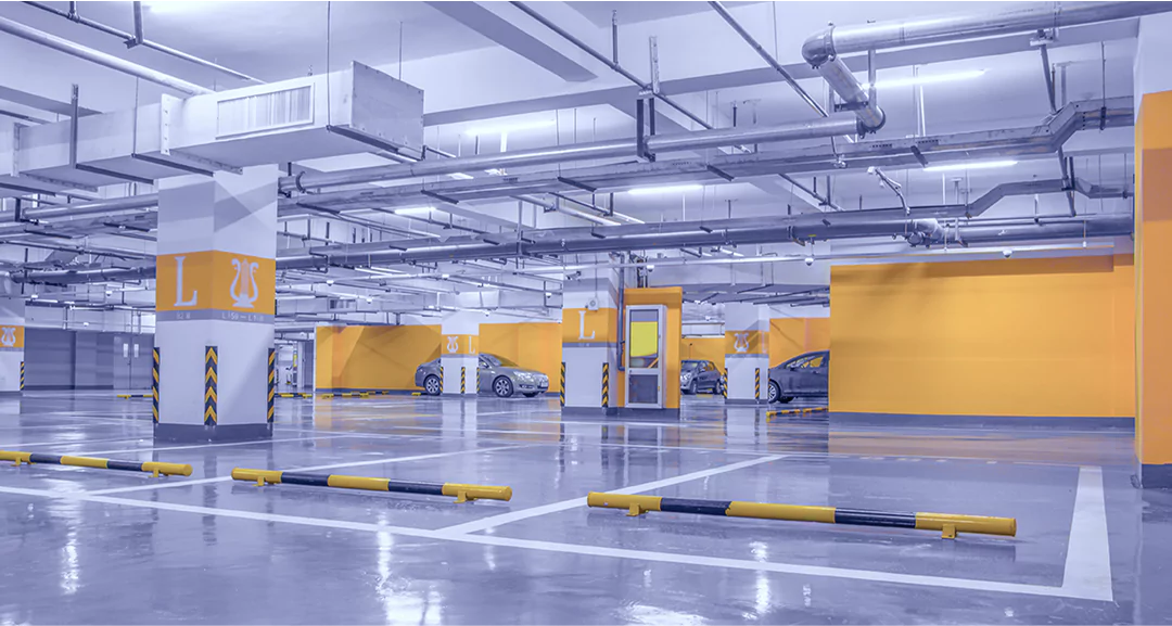 Modern underground parking facility at a commercial hub for rent in Delhi NCR