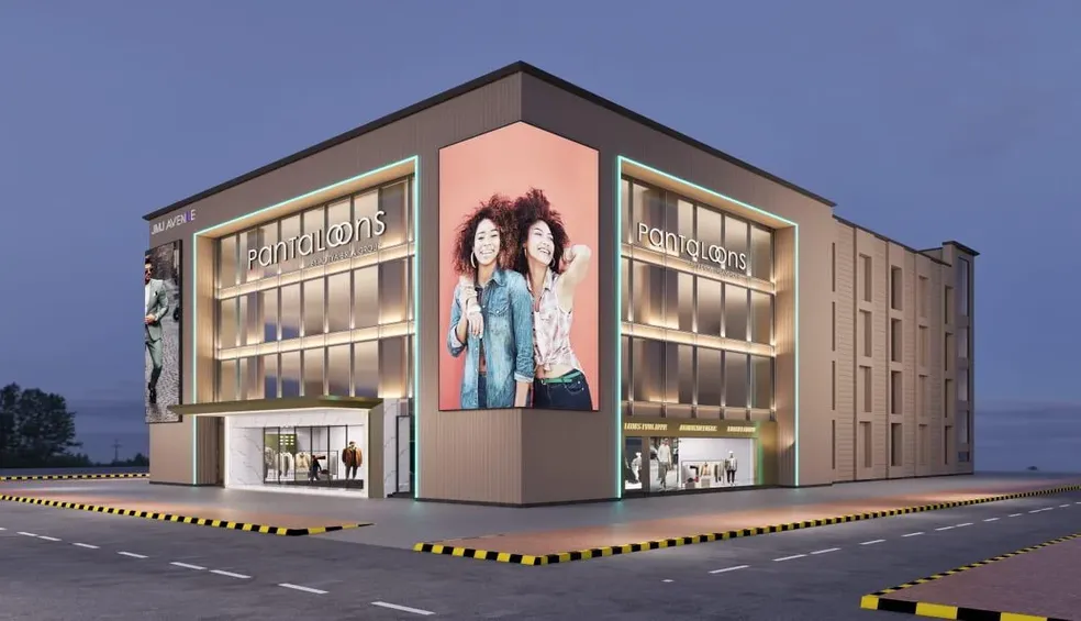 Modern commercial hub for lease in Delhi NCR featuring a Pantaloons retail showroom with glass windows.