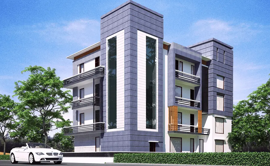 JMJ Estate modern commercial building development in India with grey panels and contemporary architectural design.